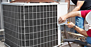 two of our pros in Columbia MD are repairing a HVAC unit